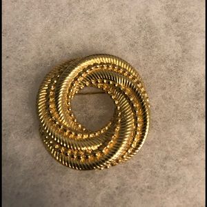Gold tone brooch